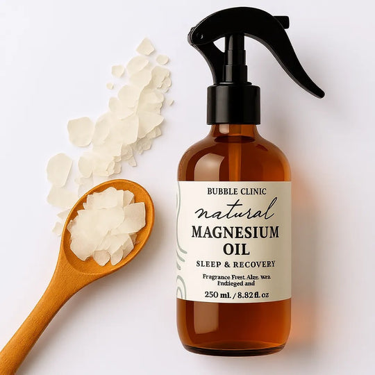 Bottle of Bubble Clinic natural magnesium oil with a wooden spoon and magnesium flakes on a light background representing natural Australian magnesium oil