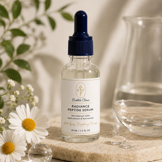 radiance boosting peptide serum with a dark blue dropper cap, styled on a stone surface with white daisies, and soft floral background elements representing best serum for mature skin.