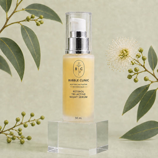 Bubble Clinic Retinol Tri-Active Night Serum 50 mL on a muted sage studio background with Australian botanical styling
