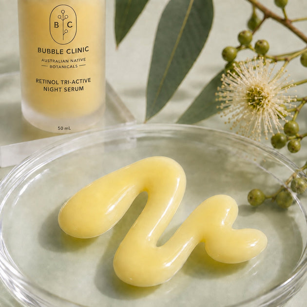 Creamy milky texture of Bubble Clinic Retinol Tri-Active Night Serum with frosted 50 mL bottle and Australian botanical styling
