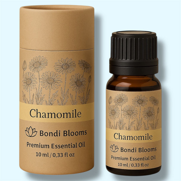 Packaging and bottle of pure Roman Chamomile Essential Oil on a beige background representing best pure premium essential oils Australia. 