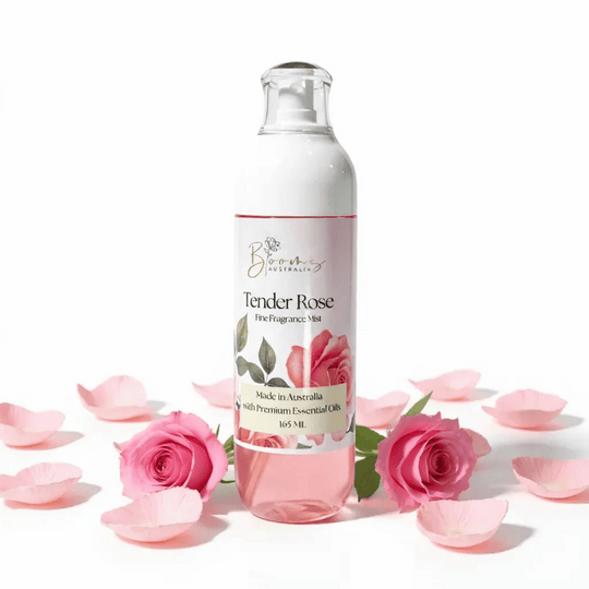 Tender Rose fragrance mist bottle with pink roses and petals on a white background representing best australian luxury perfumes and fragrances