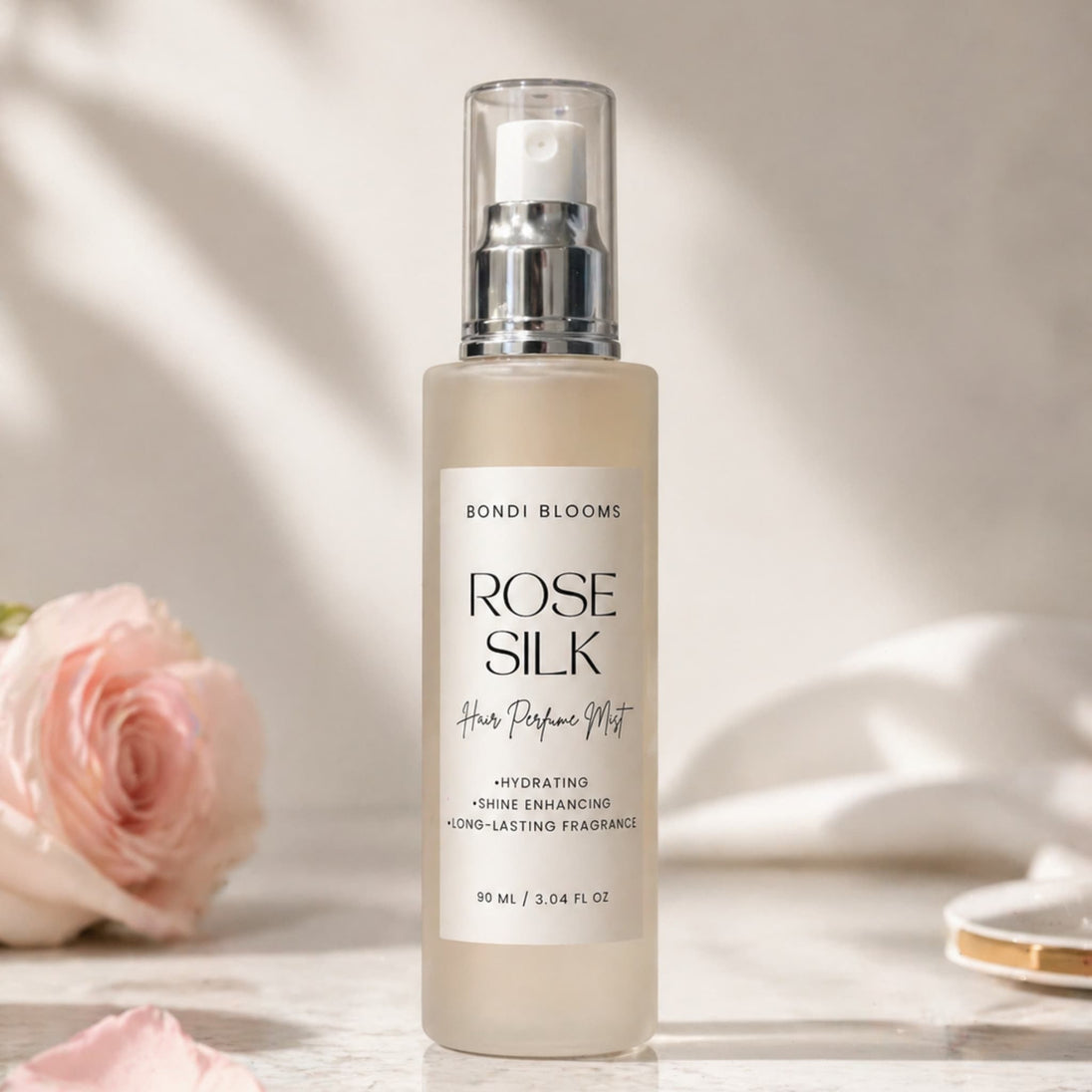 Rose Silk hair perfume with a pink rose in the background representing best rose hair perfume with keratin and essential oils australia