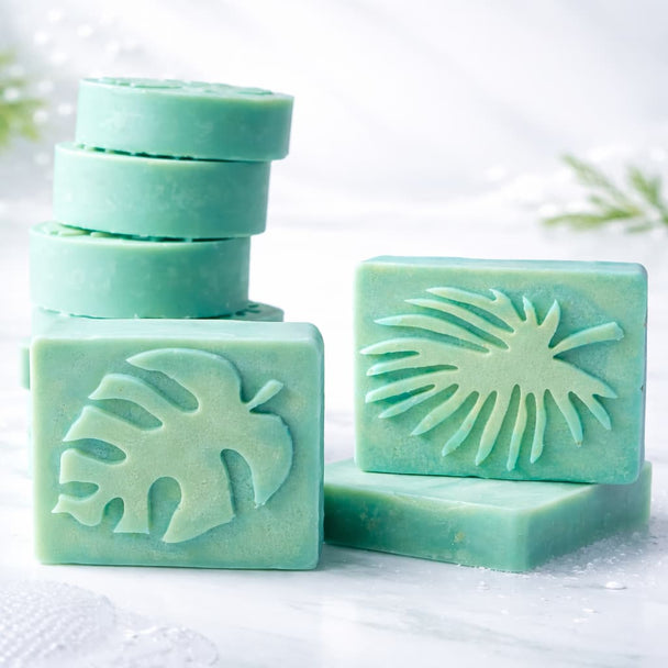 green solid cleanser bars with sulfur and salicylic acid for blemishes stacked on a white background representing best cleansing bars for acne. 