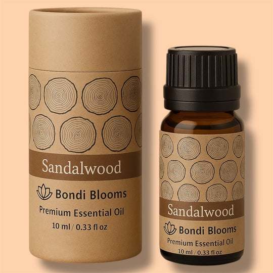 Sandalwood essential oil bottle and packaging on a beige background representing best pure therapeutic grade essential oil Australia.