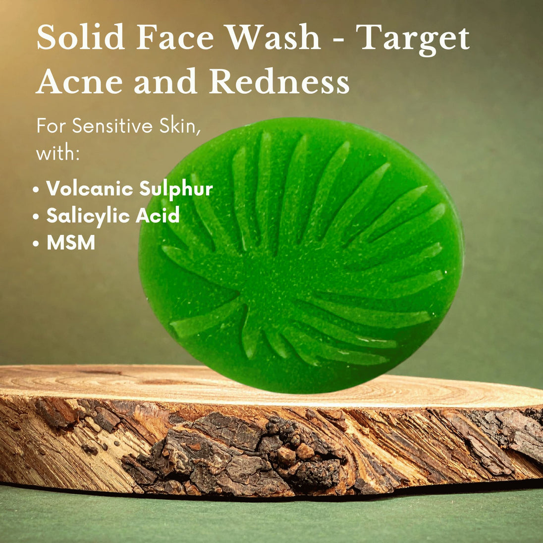 Green solid face wash bar on a wooden block with text about its benefits for sensitive skin.