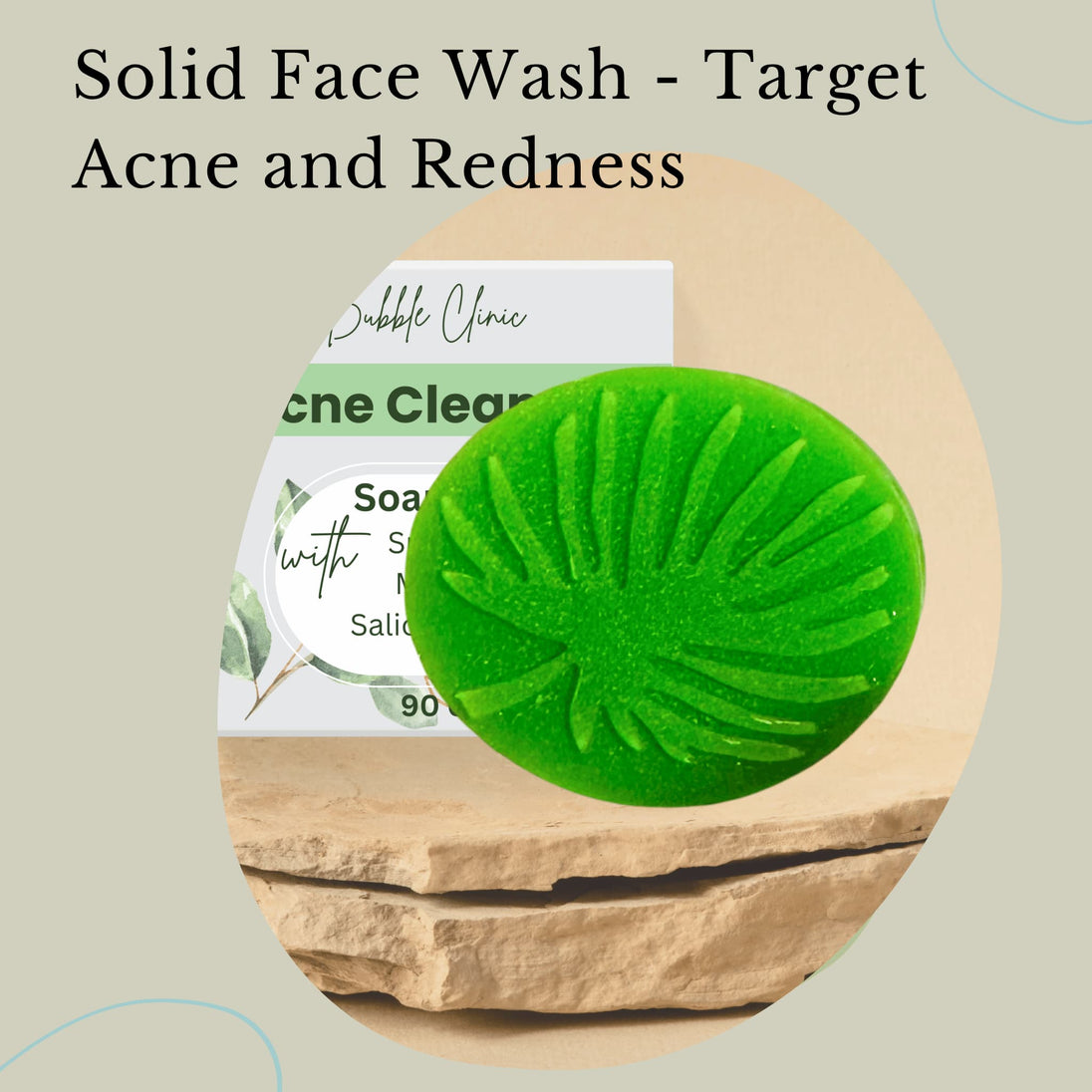 Green solid face wash bar on a stone surface with text about targeting acne and redness.