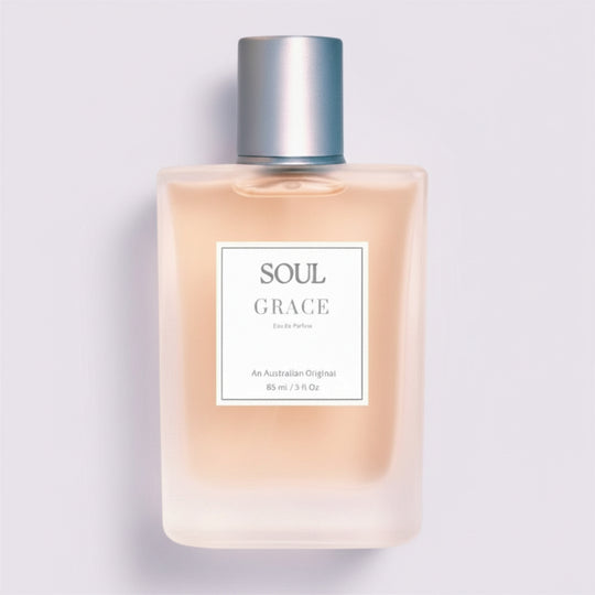 Perfume bottle 'Soul Grace' roses aromatherapy Australian perfume on a light beige background representing Australian original perfumes with essential oils.