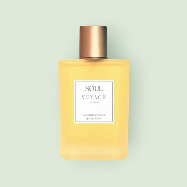 Bottle of Soul Voyage Aromatherapy Perfume with white label 85 ml on a light beige background representing natural Australian Aromatherapy Perfume with essential oils. 