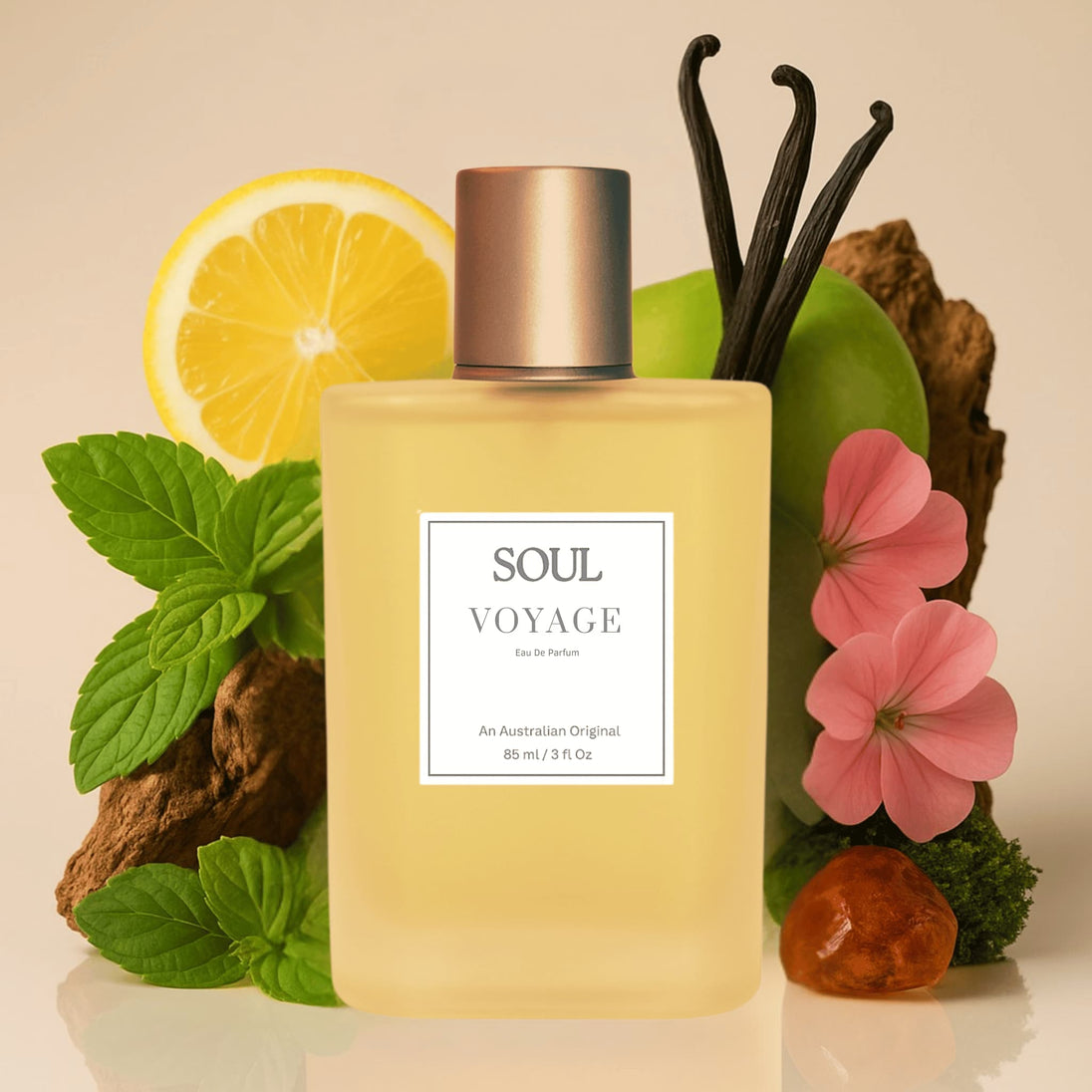 Perfume bottle labeled 'Soul Voyage' surrounded by natural elements like a lemon, flowers, and leaves representing natural essential oils and fragrance notes in the perfume on a beige background.