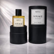 Perfume bottle and packaging labeled 'Soul Voyage' on a reflective surface with a gray background representing best high end luxury australian original perfume.