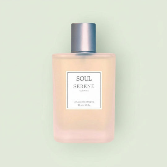 Perfume bottle labeled 'Soul Serene' on a light gray background represeenting Australian aromatherapy natural perfumes with essential oils.