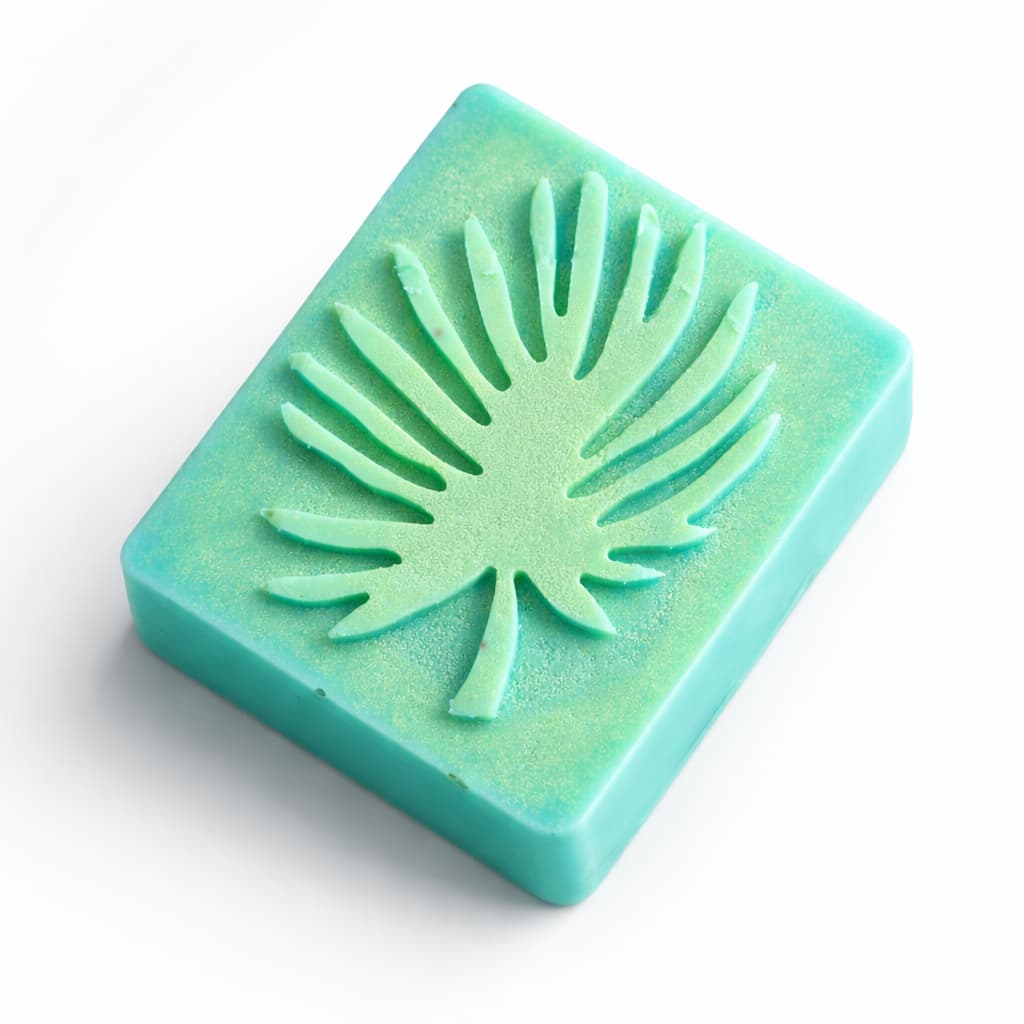 green solid cleanser bar with sulfur and salicylic acid for blemishes on a white background representing best soap free cleansing bars for acne. 