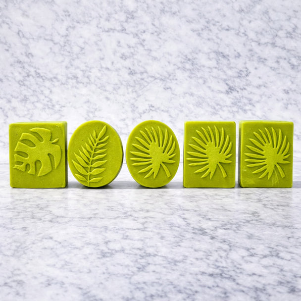 green sulfur cleansing bars with MSM and salicylic acid to target blemishes and troubled skin on a light marble surface representing best australian made cleansers for blemishes and oily skin.