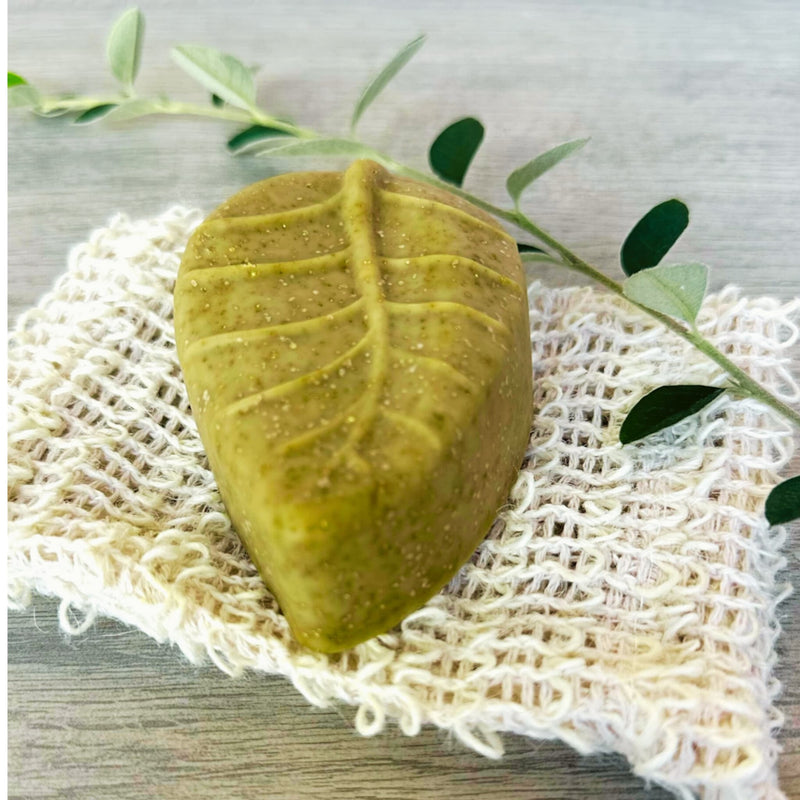 Close-up of leaf-shaped Emu Oil Sulphur and MSM artisan soap bar
