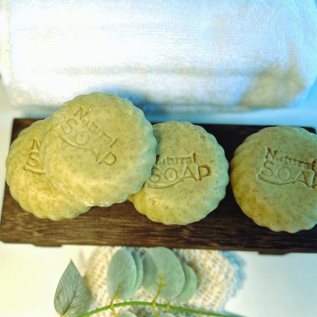 top view of natural green sulphur soap with emu oil and MSM infused with comfrey, spirulina, wheatgrass to calm skin and treat acne.