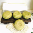 front and side view of natural green acne sulphur soap with emu oil, volcanic sulphur and MSM and natural oils and butters infused in comfrey, moringa and spirulina to treat acne and troubled skin.