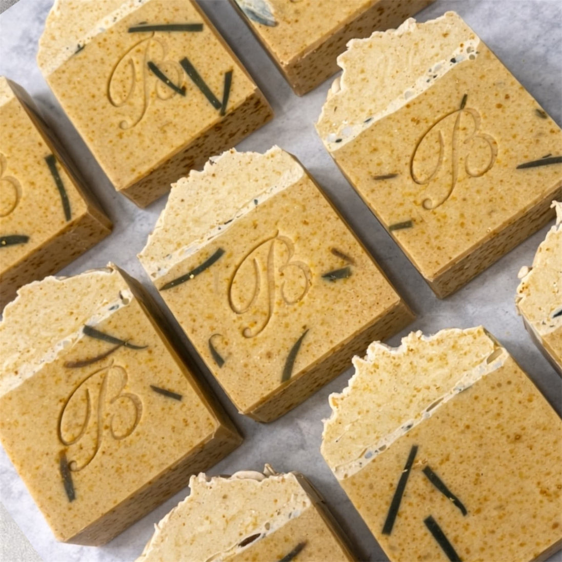 Sulphur soap for blemishes and troubled skin flat laid with a brand logo on a marble surface representing natural Australian skincare for blemishes and troubled skin