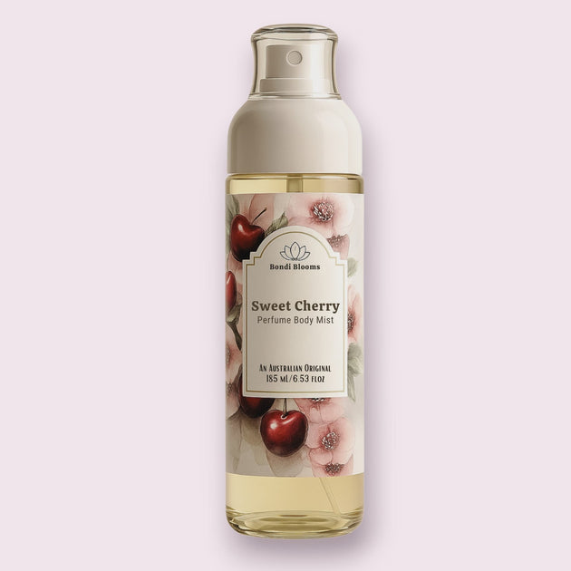 Fine-mist-Perfume body mist bottle of long lasting 'Sweet Cherry' perfume fragrance - sweet summery fragrance on a light pink background representing best Australian made perfume body fragrance mists. 