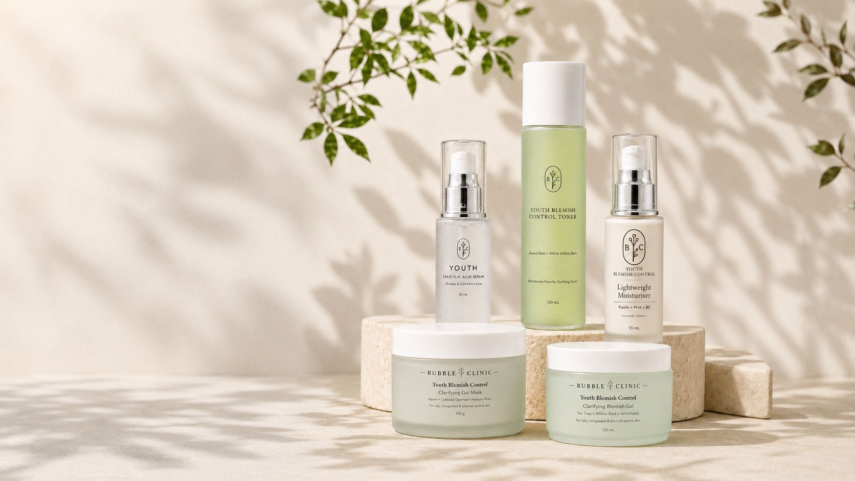 teen acne control routine products on a beige botanical background including salicylic acid serum, spot treatment, clarifying gel, clarifying clay mask and youth blemish control toner. 
