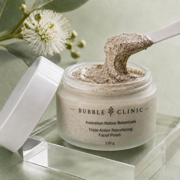 Close-up creamy texture of Bubble Clinic Triple-Action Resurfacing Facial Polish with visible botanical polishing particles