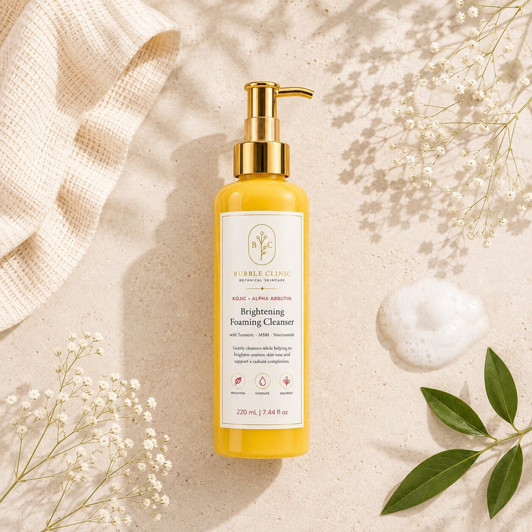 Brightening Foaming Cleanser flat lay with cleansing cloth and soft foam