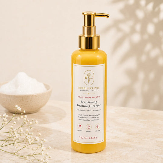 Brightening Foaming Cleanser close-up with gold pump and soft cleansing foam