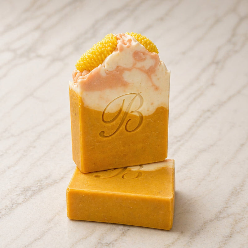 Two Bubble Clinic Kojic Acid Niacinamide Turmeric Soap bars on a white background