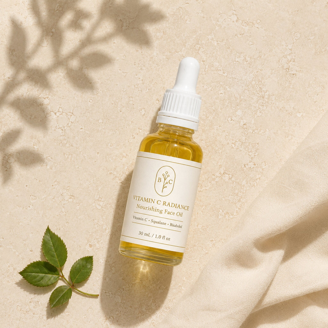 Top-down flat lay of Bubble Clinic Vitamin C Radiance Face Oil in a filled 30 mL clear bottle.