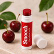 Smooch Cherry Bomb tinted lip oil with sheer cherry tint and vitamins B, C and E