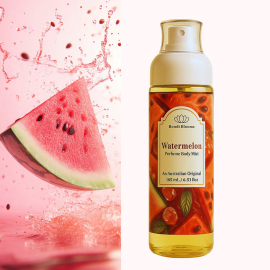 Bottle of Watermelon perfume body mist with a watermelon slice and juice splashes on a pink background representing best Australian body perfume fragrance mists.