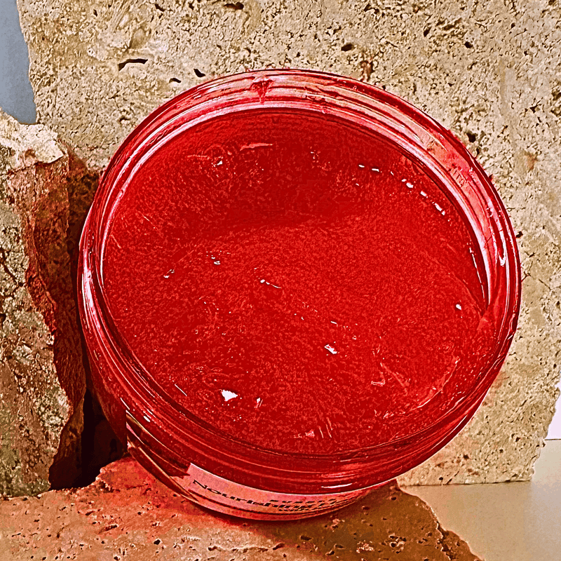 Open jar of Watermelon Keratin Hair Styling Gel showing the clear glossy texture.