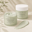 Creamy sage kaolin and bentonite clay mask texture with open Bubble Clinic 160 g jar