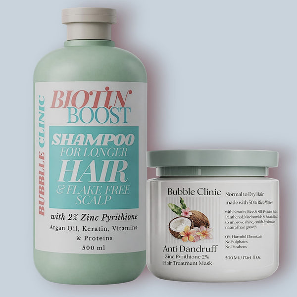 Biotin Boost shampoo and Bubble Clinic anti-flaking hair mask on a light gray background